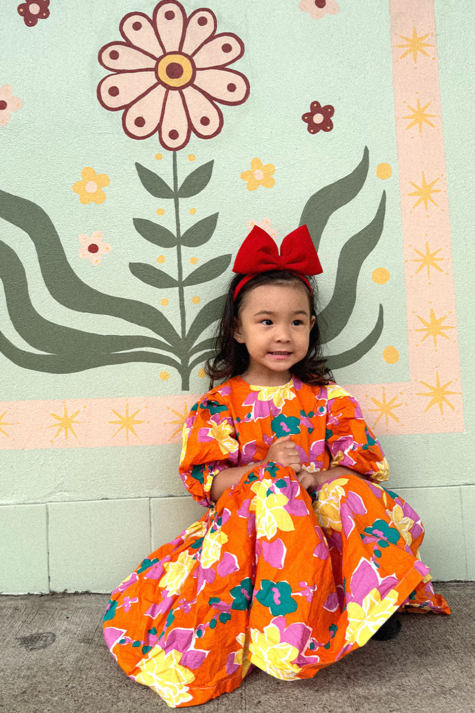 Maxi Floral Dress in orange multicolour long puffy sleeves oversize fun and playful front photo lifestyle - Sailor and Sunny